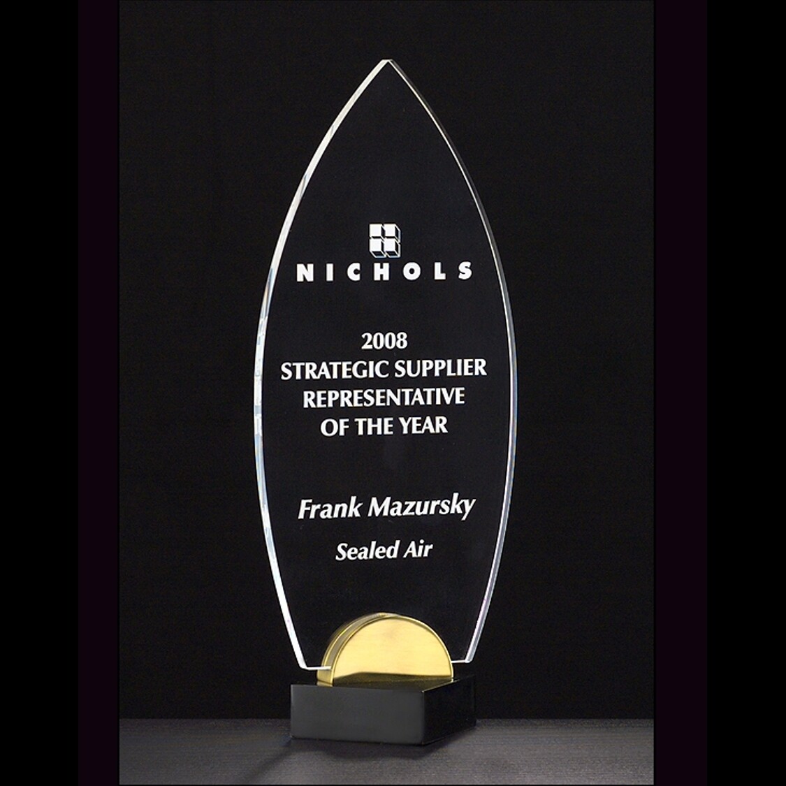 clear acrylic flame on black and metal base award with standard engraving