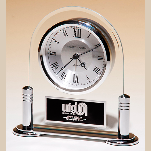 arched glass clock with silver base and uprights with standard engraving