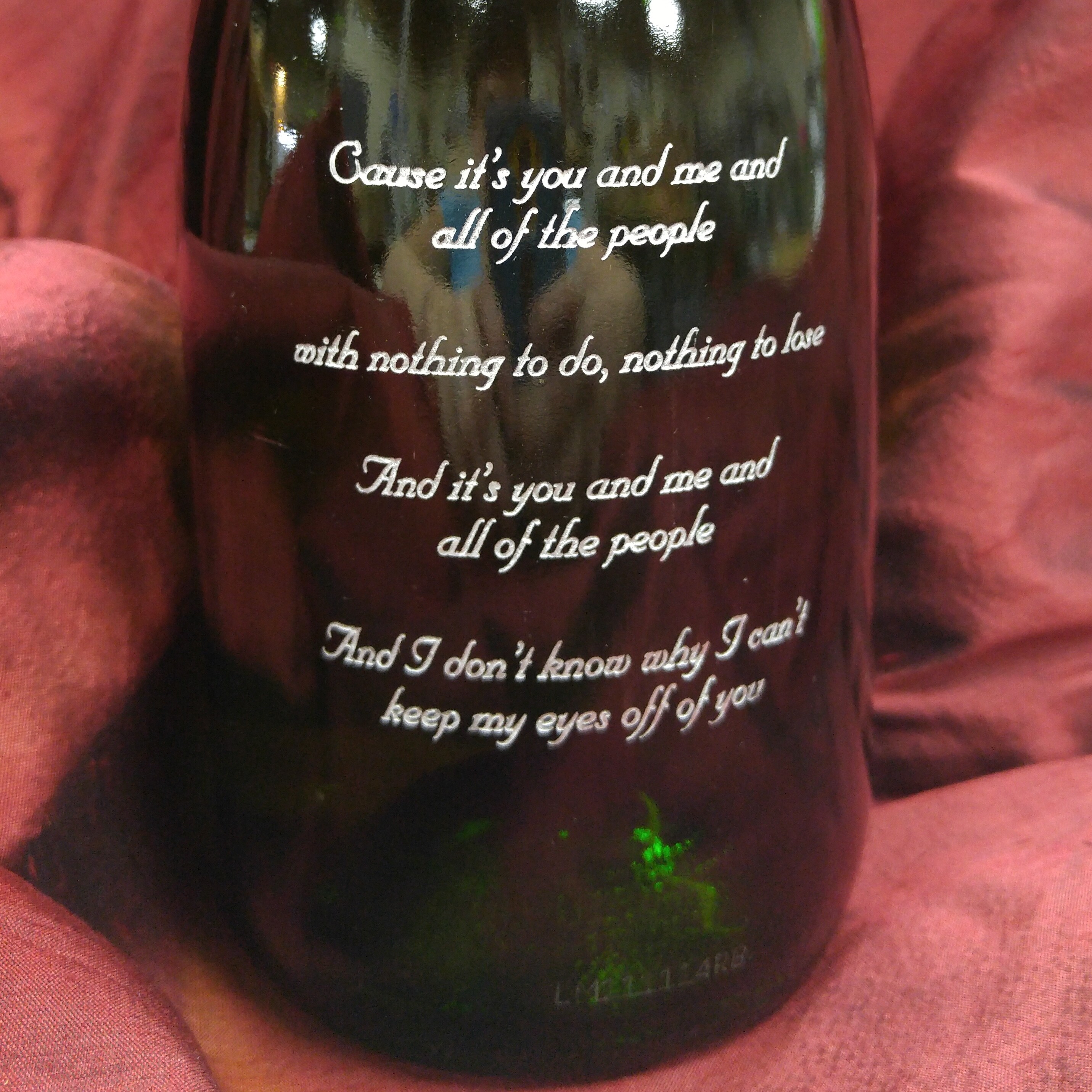 Photo Sand Carved on Champagne Bottle