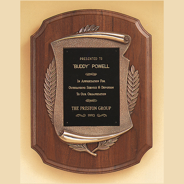 large walnut plaque with bronze casting