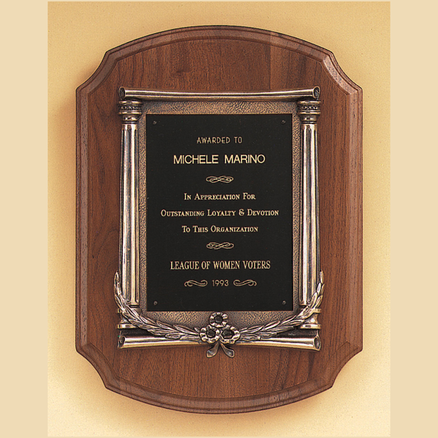 large walnut wall plaque with bronze casting