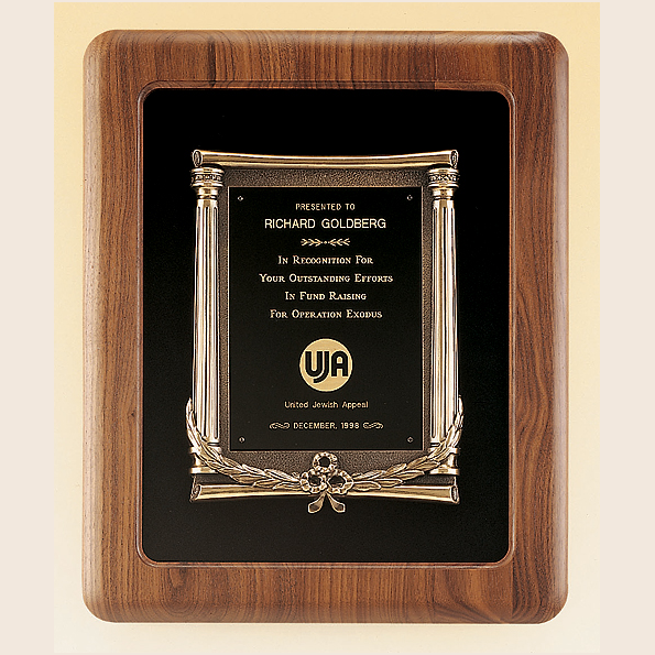 walnut frame wall plaque with bronze casting
