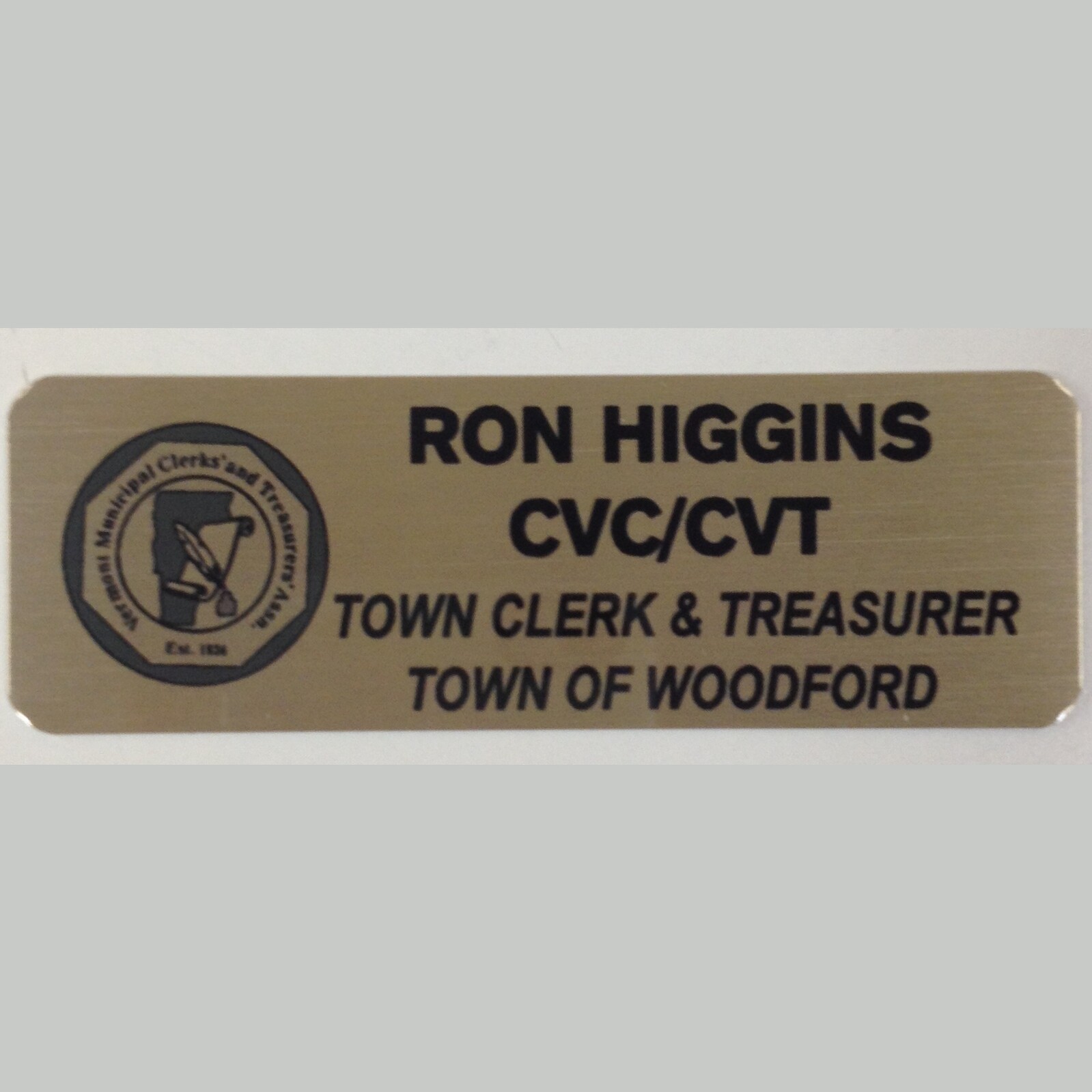1x3 gold aluminum name tags with Vermont Municipal Clerks and Treasurers Logo